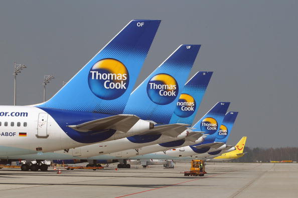 MUNICH, GERMANY - APRIL 17:  Thomas Cook airplanes are parked at Munich Airport on April 17, 2010 in Munich, Germany. Munich Franz Josef Strauss Airport was closed due to the cloud of volcanic ash from Iceland moving across Northern Europe and will remain closed for an undetermined period.  (Photo by Alexander Hassenstein/Getty Images)
