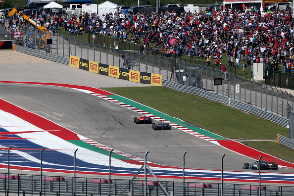 AUSTIN, TX - OCTOBER 21:  Kimi Raikkonen of Finland driving the (7) Scuderia Ferrari SF71H leads Lewis Hamilton of Great Britain driving the (44) Mercedes AMG Petronas F1 Team Mercedes WO9 on track during the United States Formula One Grand Prix at Circuit of The Americas on October 21, 2018 in Austin, United States.  (Photo by Charles Coates/Getty Images)