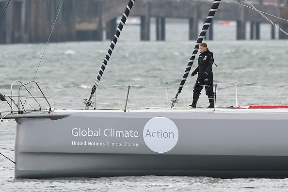 Swedish climate activist Greta Thunberg stands aboard the Malizia II IMOCA class sailing yacht off the coast of Plymouth, southwest England, on August 14, 2019, as she prepares to start her journey across the Atlantic to New York where she will attend the UN Climate Action Summit next month. - A year after her school strike made her a figurehead for climate activists, Greta Thunberg believes her uncompromising message about global warming is getting through -- even if action remains thin on the ground. The 16-year-old Swede, who sets sail for New York this week to take her message to the United States, has been a target for abuse but sees that as proof she is having an effect. (Photo by Ben STANSALL / AFP)        (Photo credit should read BEN STANSALL/AFP/Getty Images)