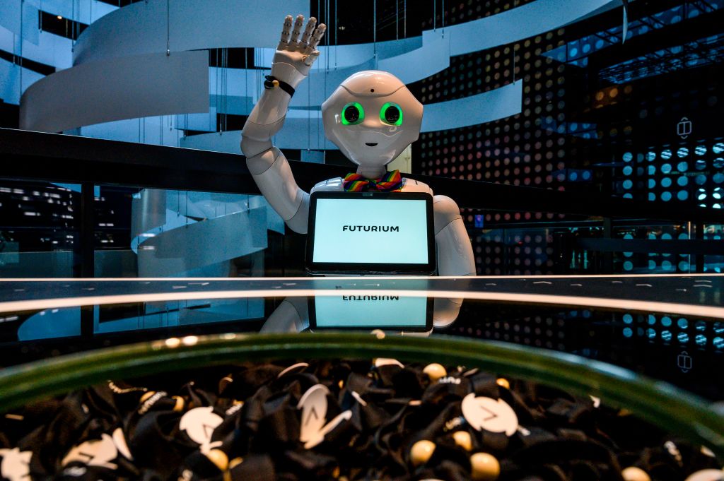 An interactive robot greets visitors at the "Futurium", House of Futures in Berlin after the official opening ceremony on September 5, 2019. - Created as a venue where significant national and international developments in scientific, technical and social research can be presented and discussed, the Futurium seeks to be an independent space for dialogue between the government, the scientific community, industry and society. (Photo by John MACDOUGALL / AFP)        (Photo credit should read JOHN MACDOUGALL/AFP/Getty Images)
