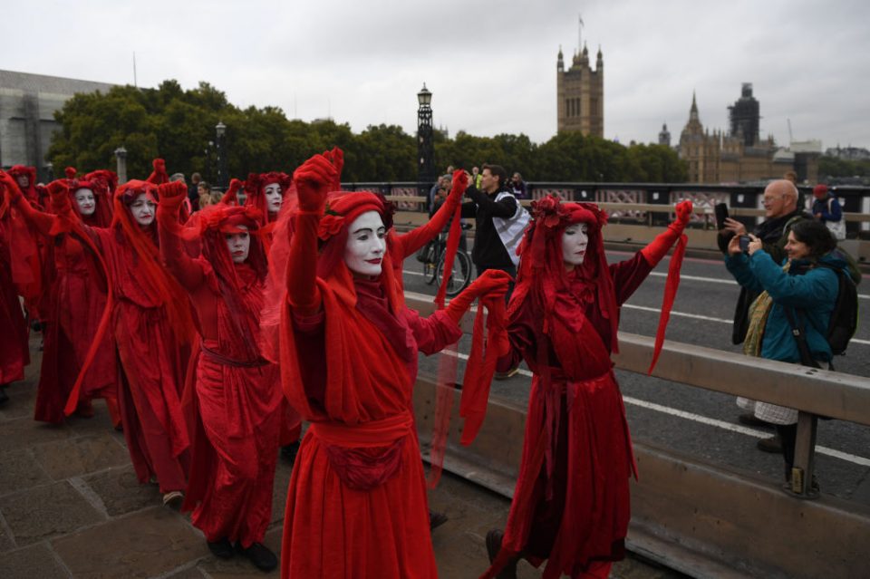 Police are fighting to take the bridge back from Extinction Rebellion protesters (Getty)