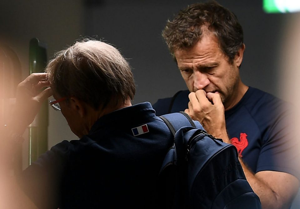 France's head coach Jacques Brunel (L) speaks with the assistant coach Fabien Galthie at the end of a training session at the Suizenji Athletic Field in Kumamoto, on October 8, 2019, during the Japan 2019 Rugby World Cup. (Photo by FRANCK FIFE / AFP) (Photo by FRANCK FIFE/AFP via Getty Images)