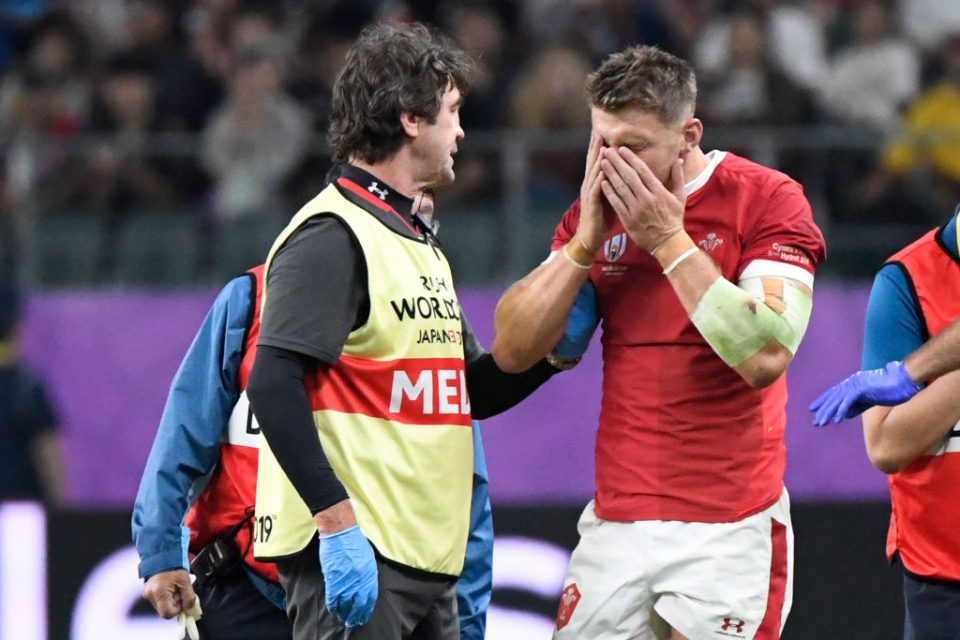 Wales' fly-half Dan Biggar (R) reacts after an injury during the Japan 2019 Rugby World Cup Pool D match between Wales and Fiji at the Oita Stadium in Oita on October 9, 2019. (Photo by CHRISTOPHE SIMON / AFP) (Photo by CHRISTOPHE SIMON/AFP via Getty Images)