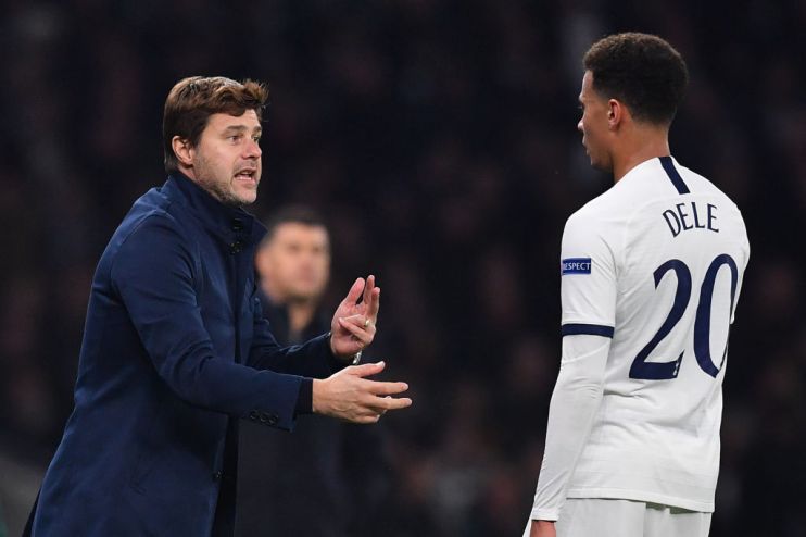Tottenham Hotspur's Argentinian head coach Mauricio Pochettino (L) gestures to Tottenham Hotspur's English midfielder Dele Alli during the UEFA Champions League Group B football match between Tottenham Hotspur and Red Star Belgrade at the Tottenham Hotspur Stadium in north London, on October 22, 2019. (Photo by Ben STANSALL / AFP) (Photo by BEN STANSALL/AFP via Getty Images)