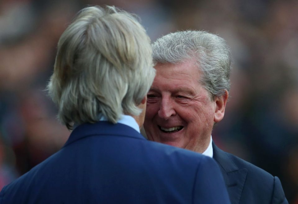 LONDON, ENGLAND - OCTOBER 05: Roy Hodgson of Crystal Palace and Manuel Pellegrini, Manager of West Ham United interact prior to during the Premier League match between West Ham United and Crystal Palace at London Stadium on October 05, 2019 in London, United Kingdom. (Photo by Catherine Ivill/Getty Images)