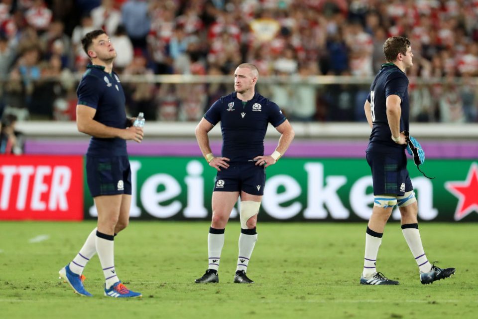 YOKOHAMA, JAPAN - OCTOBER 13: Stuart Hogg of Scotland (C) looks on following defeat in the Rugby World Cup 2019 Group A game between Japan and Scotland at International Stadium Yokohama on October 13, 2019 in Yokohama, Kanagawa, Japan. (Photo by Dan Mullan/Getty Images)