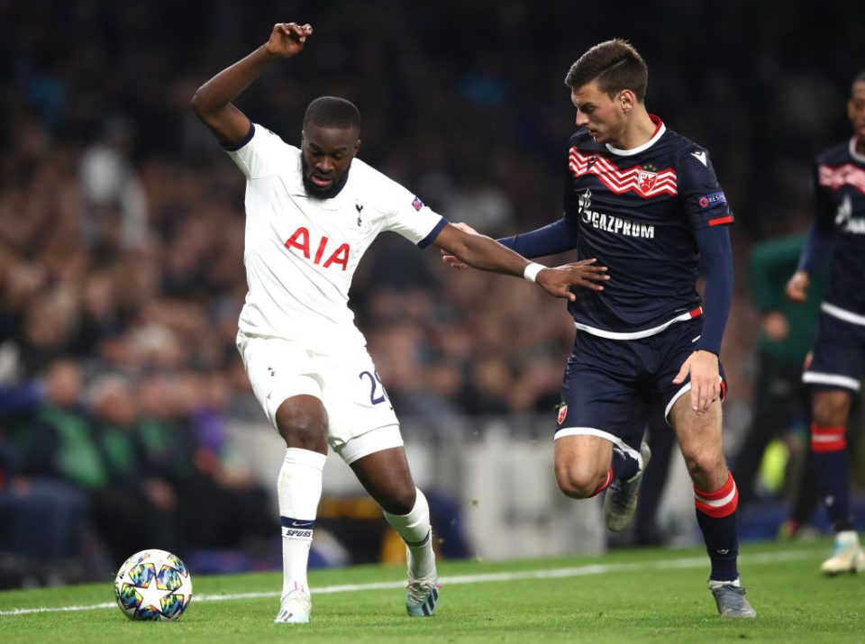 LONDON, ENGLAND - OCTOBER 22: Tanguy Ndombele of Tottenham Hotspur is challenged by Milos Vulic of Crvena Zvezda during the UEFA Champions League group B match between Tottenham Hotspur and Crvena Zvezda at Tottenham Hotspur Stadium on October 22, 2019 in London, United Kingdom. (Photo by Bryn Lennon/Getty Images)