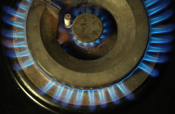 BRISTOL, UNITED KINGDOM - OCTOBER 06:  In this photo illustration gas burns on a burner on a domestic cooking appliance in a home on October 10 2008 in Bristol, England. The energy company regulator Ofgem has warned in a report published today that energy companies in the UK are not offering customers true competitiveness and are concerned that some consumers - such as those living in remote areas, or on pre-payment meters - had no choice but to pay more for their energy. The hard-hitting report coincides with a judicial review due to open in the High Court in which the UK Government is accused of failing in its legal duty to tackle fuel poverty among poorer households.  (Photo by Matt Cardy/Getty Images)