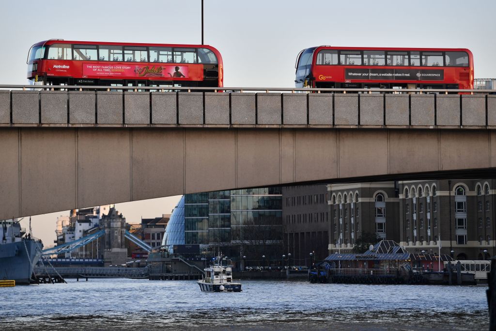 Buses are pictured on London Bridge after reports of shots being fired