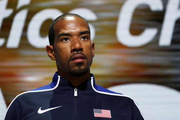 DOHA, QATAR - SEPTEMBER 30: Gold medalist Christian Taylor of the United States stands on the podium during the medal ceremony for the Men's Triple Jump final during day four of 17th IAAF World Athletics Championships Doha 2019 at Khalifa International Stadium on September 30, 2019 in Doha, Qatar. (Photo by Michael Heiman/Getty Images)
