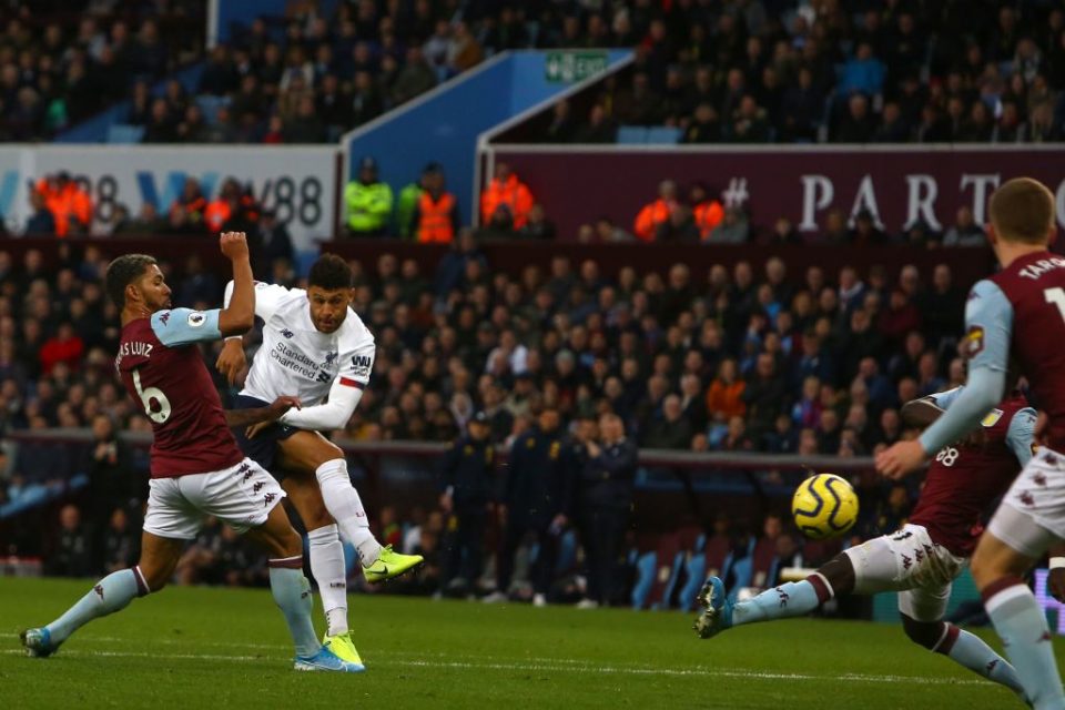 Liverpool's English midfielder Alex Oxlade-Chamberlain (2L) takes a shot at goal during the English Premier League football match between Aston Villa and Liverpool at Villa Park in Birmingham, central England on November 2, 2019. (Photo by GEOFF CADDICK / AFP) / RESTRICTED TO EDITORIAL USE. No use with unauthorized audio, video, data, fixture lists, club/league logos or 'live' services. Online in-match use limited to 120 images. An additional 40 images may be used in extra time. No video emulation. Social media in-match use limited to 120 images. An additional 40 images may be used in extra time. No use in betting publications, games or single club/league/player publications. /  (Photo by GEOFF CADDICK/AFP via Getty Images)