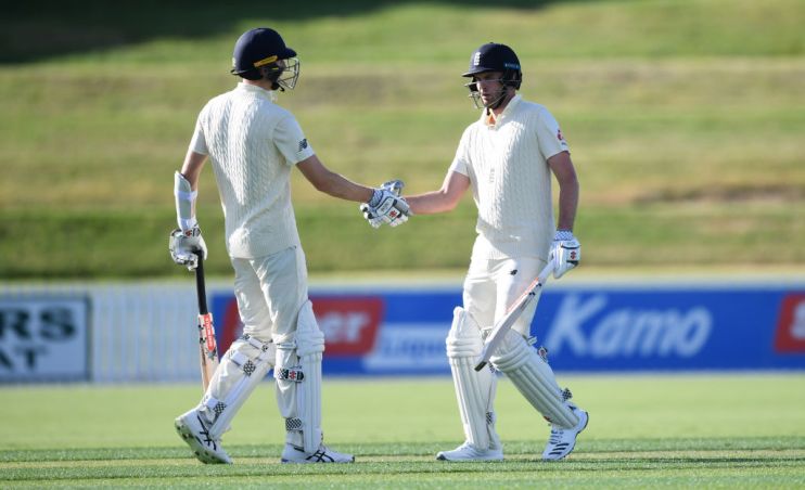 WHANGAREI, NEW ZEALAND - NOVEMBER 12: Dom Sibley of England celebrates with Zak Crawley after reaching his century during the tour match between New Zealand XI and England at Cobham Oval on November 12, 2019 in Whangarei, New Zealand. (Photo by Gareth Copley/Getty Images)