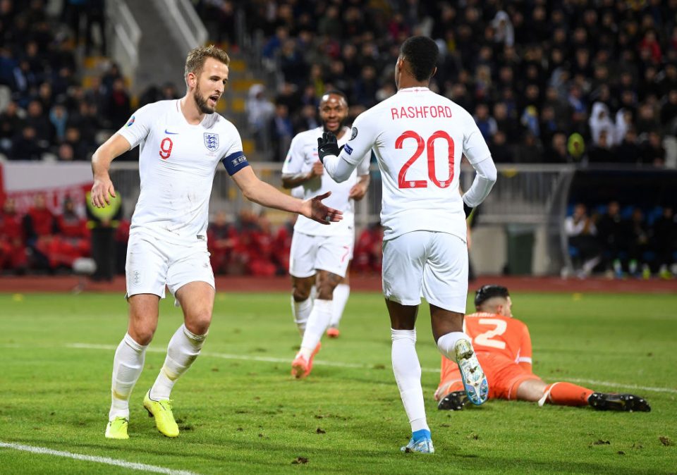 PRISTINA, KOSOVO - NOVEMBER 17:  Marcus Rashford of England celebrates scoring his team's third goal with Harry Kane during the UEFA Euro 2020 Qualifier between Kosovo and England at the Pristina City Stadium on November 17, 2019 in Pristina, Kosovo. (Photo by Michael Regan/Getty Images)