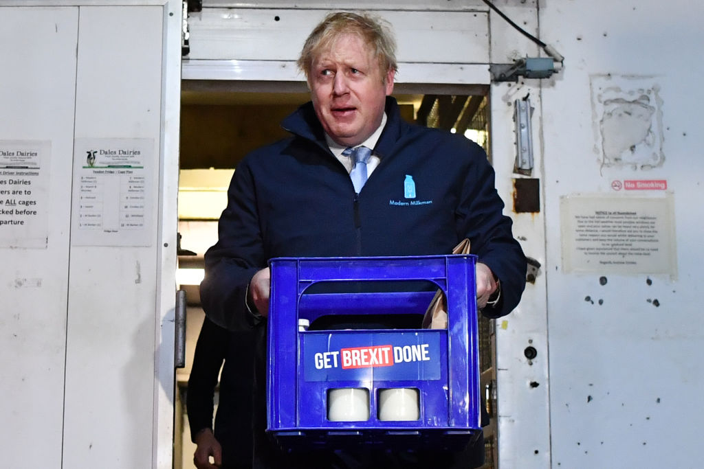Boris Johnson taking part in an early morning milk round in Yorkshire last year