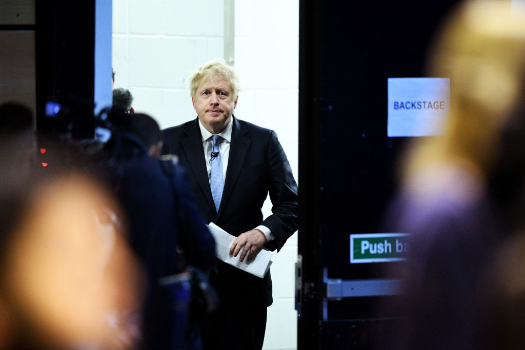 LONDON, ENGLAND - DECEMBER 11: Britain's Prime Minister Boris Johnson prepares to speak at the Copper Box Arena