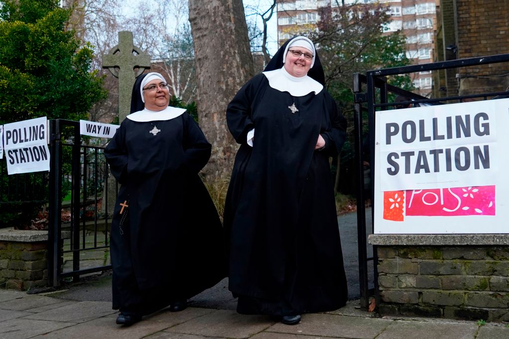 Nuns leave after voting at St John's parish hall polling station in London