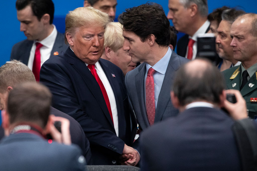 Donald Trump and Justin Trudeau meet at the Nato summit
