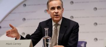 Bank of England holds rates as it slashes growth forecasts