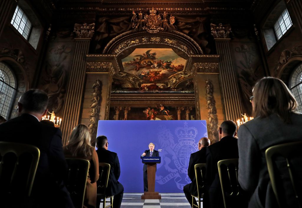 Britain's Prime Minister Boris Johnson reacts as he delivers a speech at the Old Royal Naval College in Greenwich, south east London on February 3, 2020. - Britain on Monday said it wanted a "thriving trade and economic relationship" with the European Union, as it set out its position for future trade talks after it left the bloc. But Prime Minister Boris Johnson pledged: "We will not engage in some cut-throat race to the bottom. We are not leaving the EU to undermine European standards. We will not engage in any kind of dumping, whether commercial, social or environmental." (Photo by Frank Augstein / POOL / AFP) (Photo by FRANK AUGSTEIN/POOL/AFP via Getty Images)