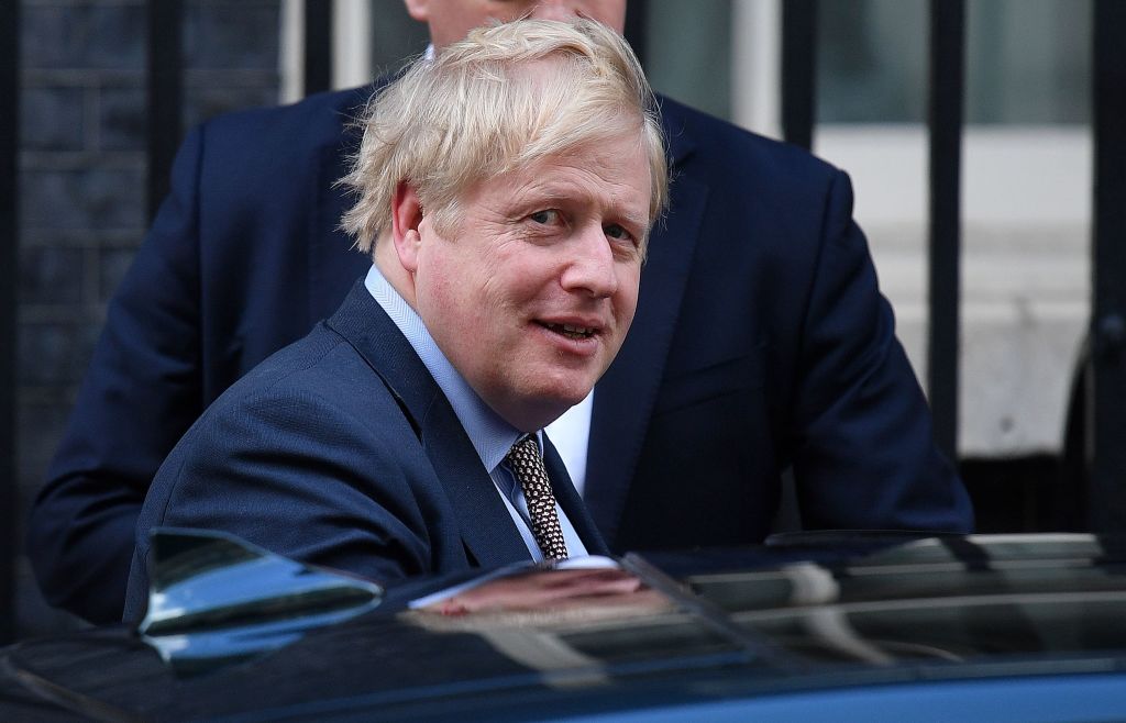 Britain's Prime Minister Boris Johnson leaves from 10 Downing Street in London on February 11, 2020, before heading to the House of Commons where he is expected to make a statement. - British Prime Minister Boris Johnson was set Tuesday to announce his plans for the HS2 high-speed railway, with reports suggesting he will stick with the long-running project despite soaring costs (Photo by Justin TALLIS / AFP) (Photo by JUSTIN TALLIS/AFP via Getty Images)
