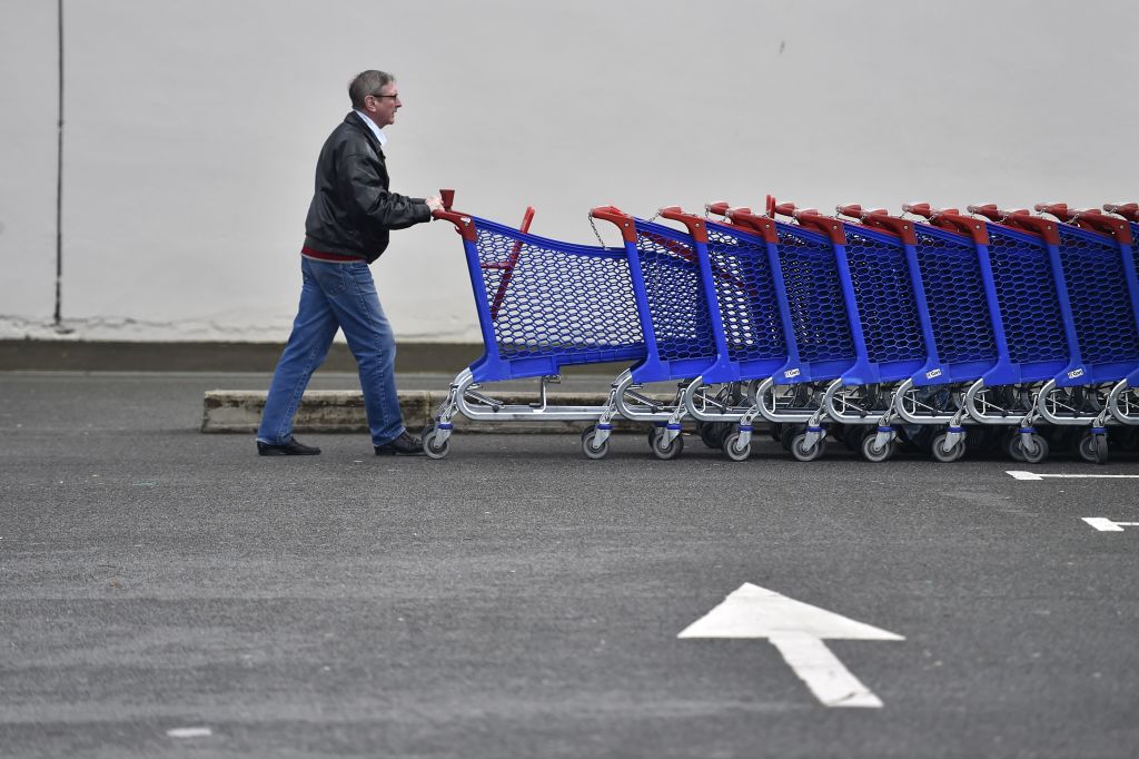 A man takes a trolley at a French retail giant Carrefour supermarket in Nantes, on January 26, 2018. 
France's Carrefour group said on January 23, 2018 it is overhauling its business in a transformation plan involving thousands of job cuts, a product revamp and new partnerships in China.   / AFP PHOTO / LOIC VENANCE        (Photo credit should read LOIC VENANCE/AFP via Getty Images)