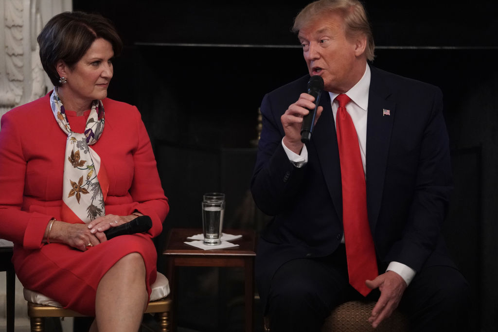 Outgoing boss of Lockheed Martin Marillyn Hewson pictured with President Trump.