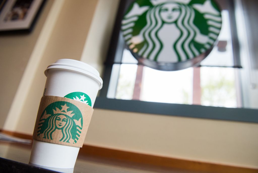 The Starbucks franchisee said it continued to benefit from recovery in travel
