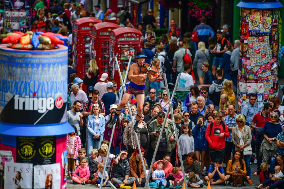 Fringe Festival Performers On Edinburgh's Royal Mile