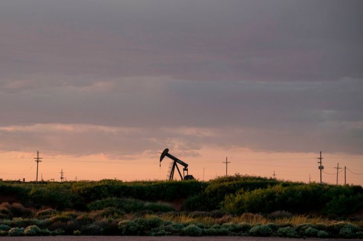 Oil prices continued to slide this morning as traders rushed to withdraw their money from upcoming futures delivery contracts amid fears they will have nowhere to put the substance.