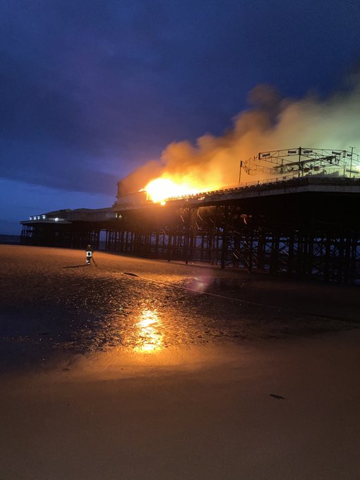 Around 50 firefighters have been tackling a blaze which broke out overnight at Blackpool&rsquo;s historic central pier.