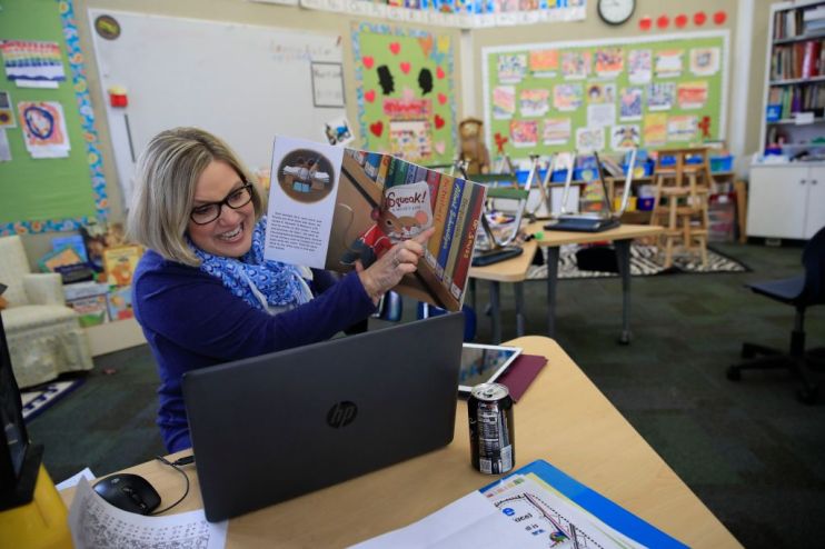 Teacher Instructs Remotely From Empty Classroom