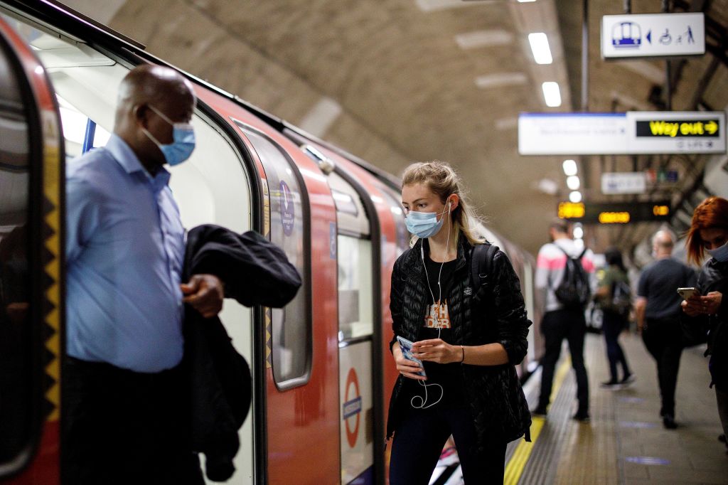 Face masks are compulsory on public transport, but it may be hard to maintain social distancing during rush hour