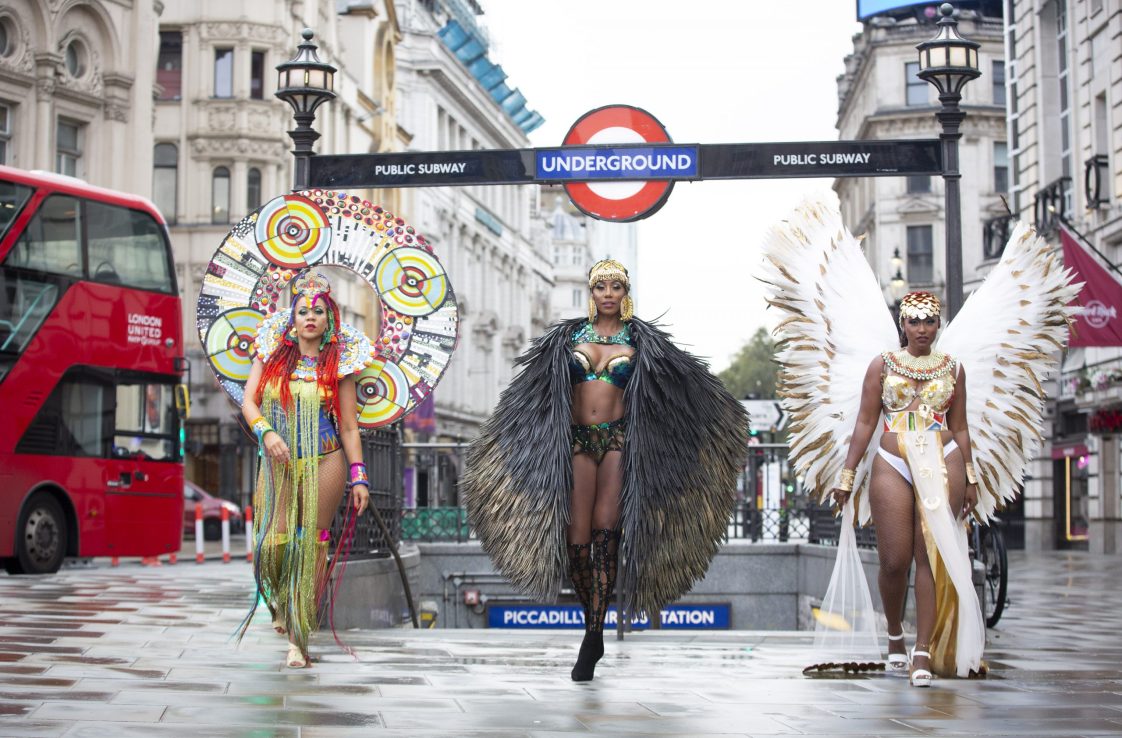 Soca dancers appear today in Piccadilly Circus ahead of the virtual Notting Hill carnival this weekend (picture credit Samsung)