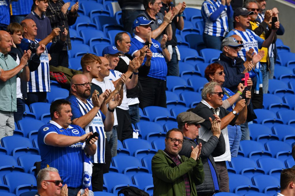 Socially-distanced supporters watch Brighton play Chelsea in a pre-season friendly
