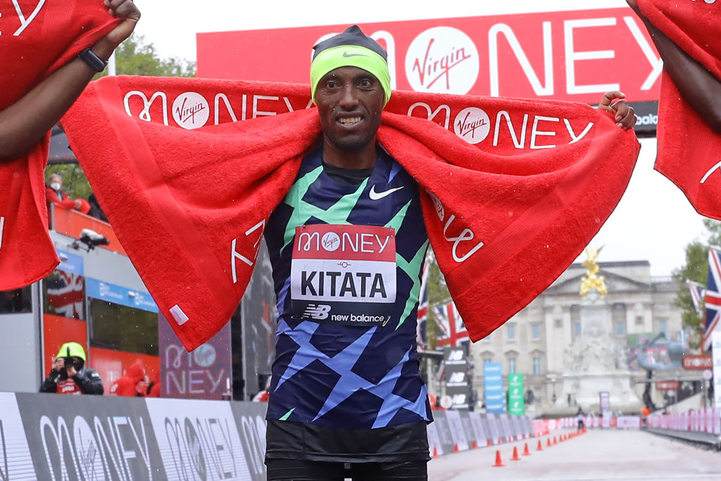 Winner Ethiopia's Shura Kitata poses at the finish of the elite men's race of the 2020 London Marathon in central London on October 4, 2020.