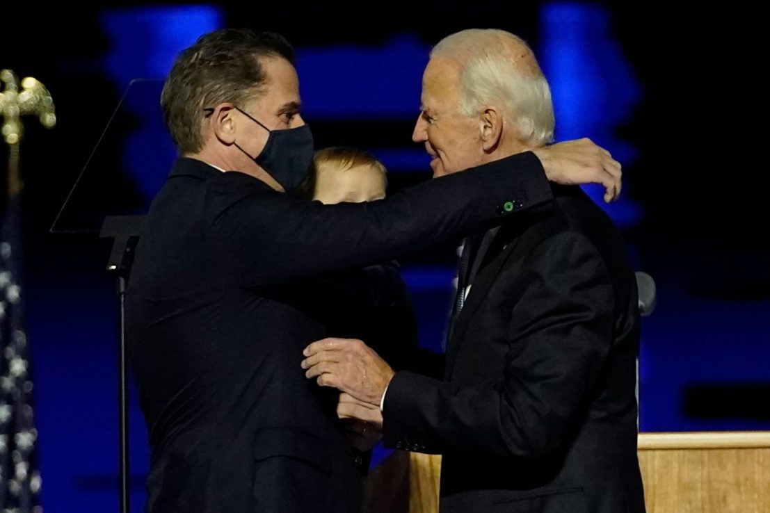 President-elect Joe Biden hugs son Hunter Biden, who has allegedly been the victim of a smear campaign.