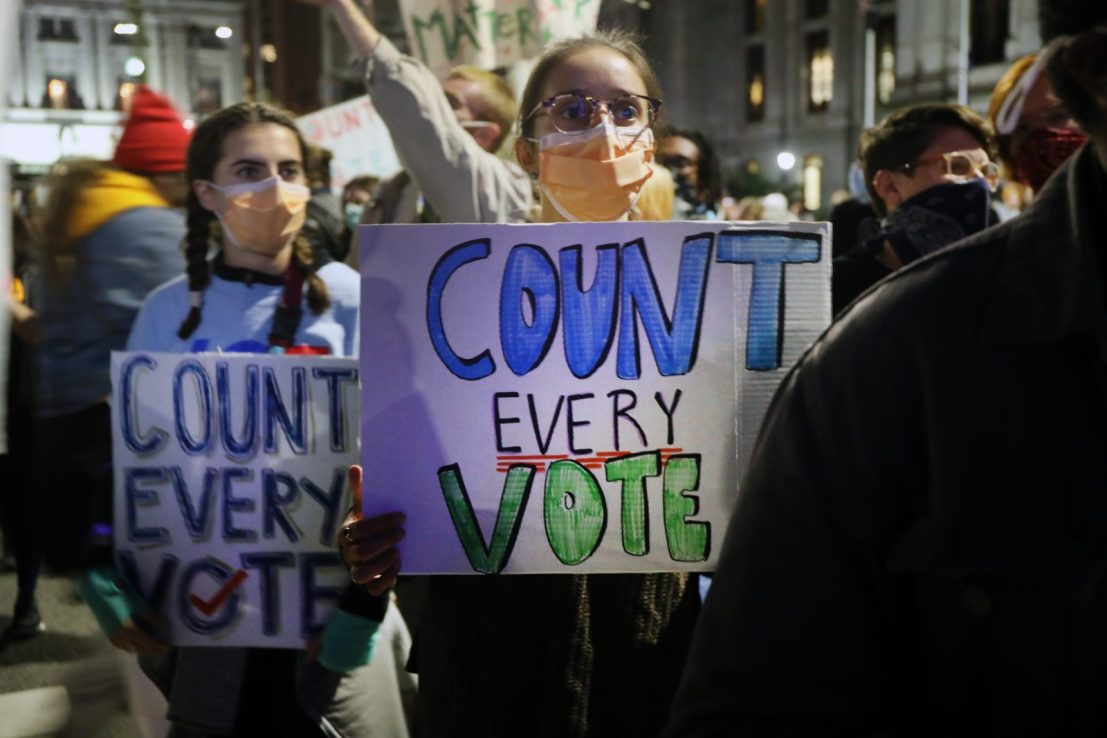 People participate in a protest last night in support of counting all votes as the election in Pennsylvania is still unresolved 