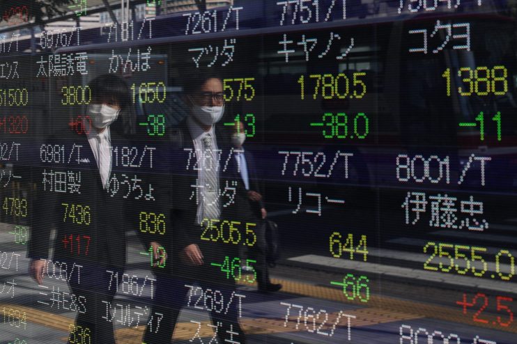 Asian stocks mixed as investors weigh &lsquo;virus vs. vaccine&rsquo;