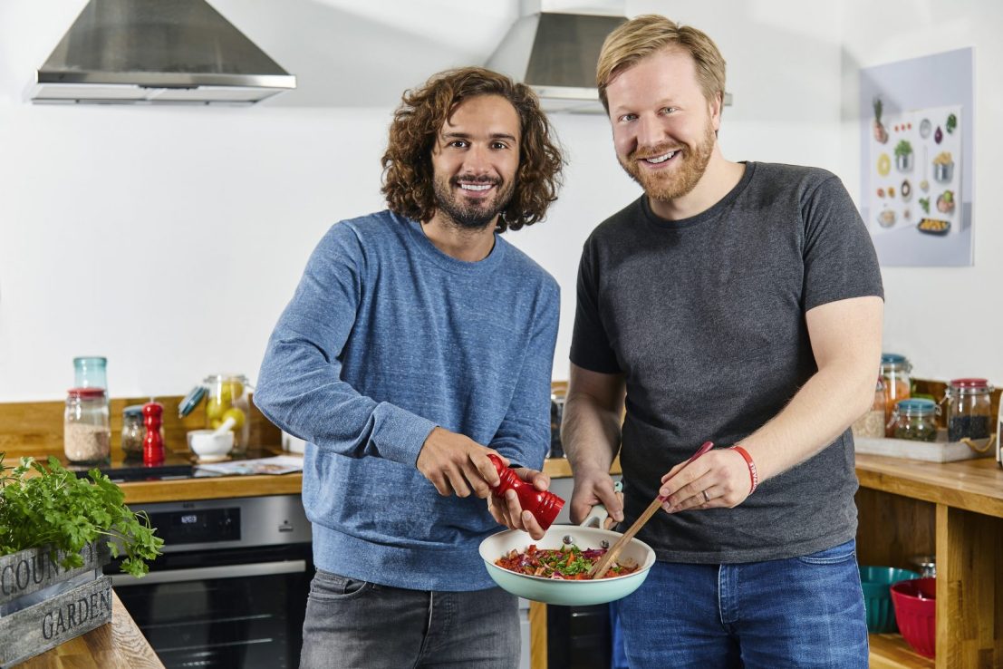Gousto boss Timo Boldt, seen here with Joe Wicks, left, blamed soaring food inflation for losses at the meal-kit delivery service