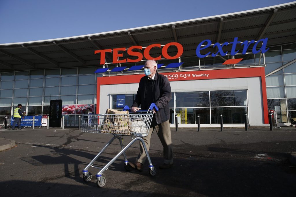 Tesco to repay £585m in emergency support with Covid risks 'behind us'