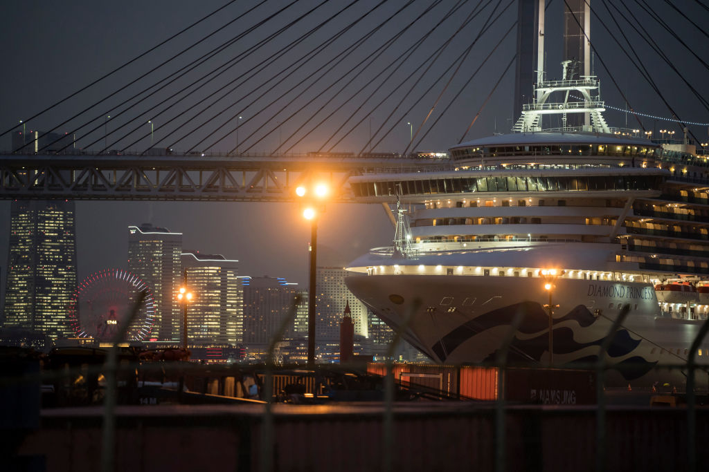 The quarantined Diamond Princess cruise ship sits docked at the Daikoku Pier. At least 634 passengers and crew onboard have tested positive for the coronavirus (Photo by Tomohiro Ohsumi/Getty Images)