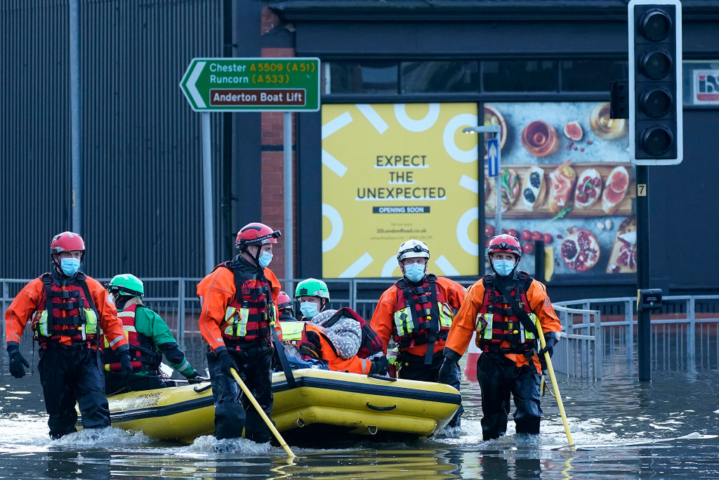 Residents being evacuated from a care home in Northwich in January 2021 due to Storm Christoph flooding. (Photo by Christopher Furlong/Getty Images)