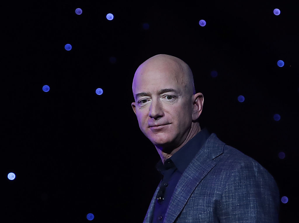 Amazon founder Jeff Bezos will join the winner of a competition on Blue Origin's first human spaceflight, with 20 July the target launchdate.