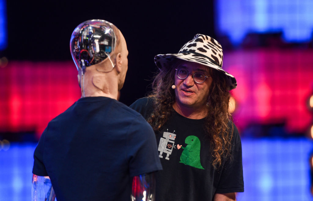 LISBON, PORTUGAL - NOVEMBER 07:  Ben Goertzel and Han The Robot, of Hanson Robotics on Centre Stage during the second day of Web Summit 2018, the global technology conference hosted annually on November 7, 2018 in Lisbon, Portugal. In 2018, more than 70,000 attendees from over 170 countries will fly to Lisbon for Web Summit, including over 1,500 startups, 1,200 speakers and 2,600 international journalists.  (Photo by David Fitzgerald /Web Summit via Getty Images)