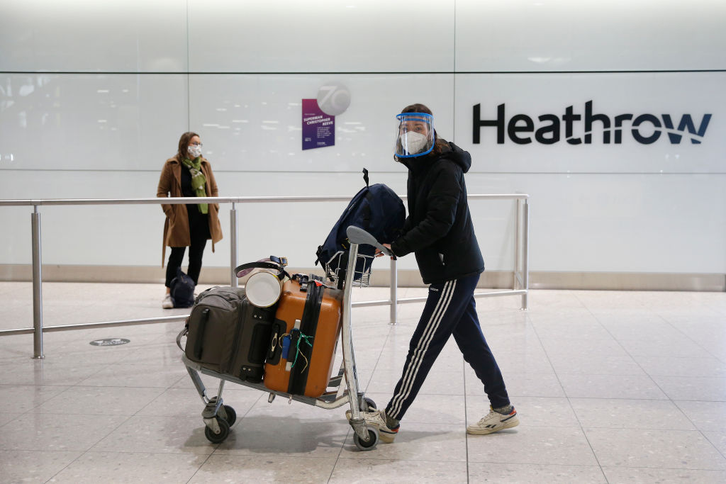 According to a National Audit Office report, travel restrictions in England were imposed without an "overall assessment" of their impact.