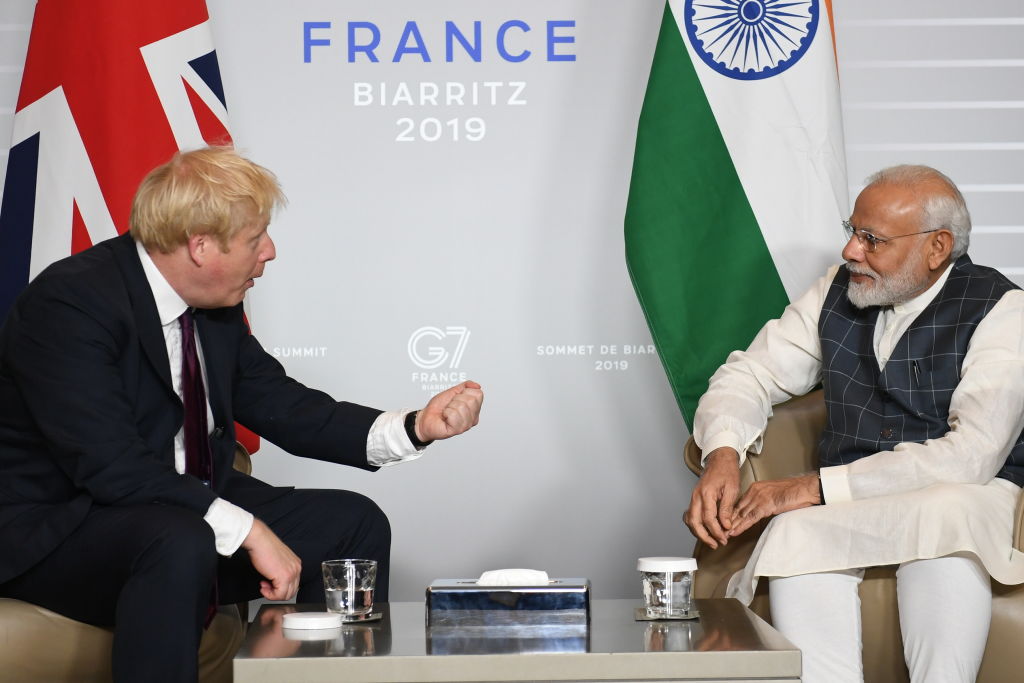 British Prime Minister Boris Johnson (L) meets Prime Minister of India Narendra Modi for bilateral talks during the G7 summit on August 25, 2019 in Biarritz, France. (Photo by Stefan Rousseau - Pool/Getty Images)