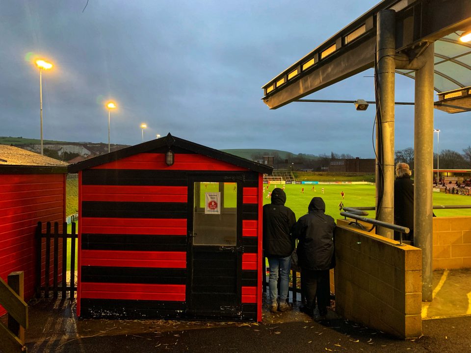 Beach huts take the place of hospitality boxes at the Dripping Pan, the distinctive home ground of Lewes FC