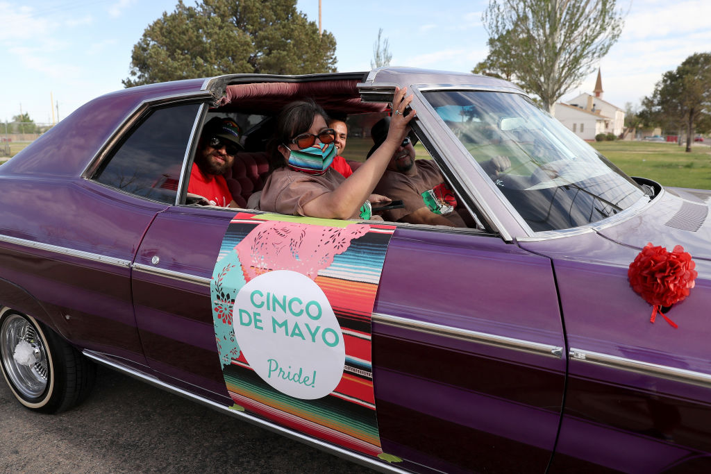 PUEBLO, COLORADO - MAY 05: Revelers cruise through neighborhoods in celebration of Cinco de Mayo on May 05, 2020 in Pueblo, Colorado.  Most traditional observations of Cinco de Mayo were canceled in Pueblo due to concern over the coronavirus (COVID-19). (Photo by Matthew Stockman/Getty Images)