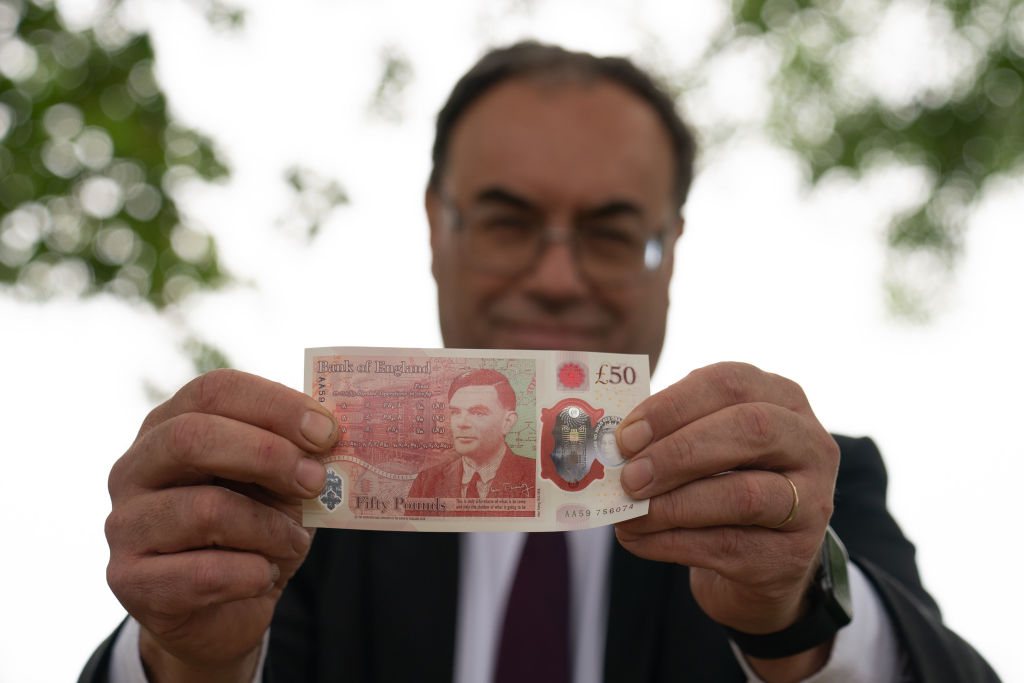Bank of England Governor Andrew Bailey with the new £50 note. (Photo by Joe Giddens - WPA Pool/Getty Images)