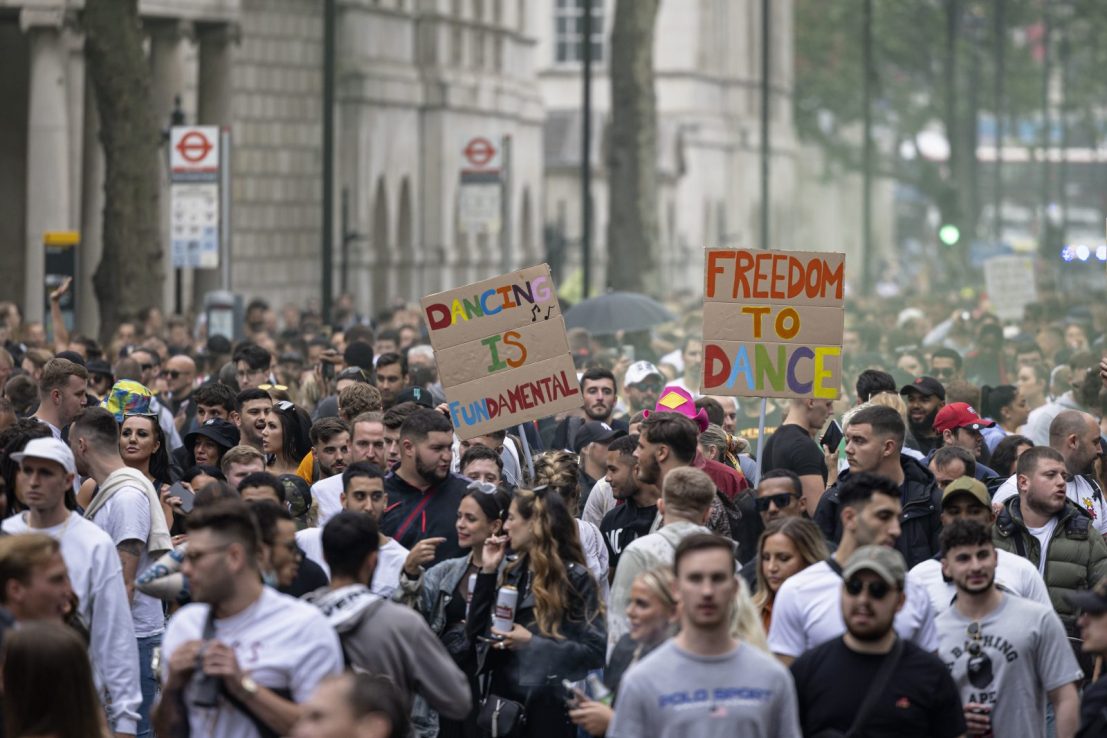 Thousands of music lovers marched along Whitehall on Sunday in protest against lockdown restrictions lasting until July 19. 